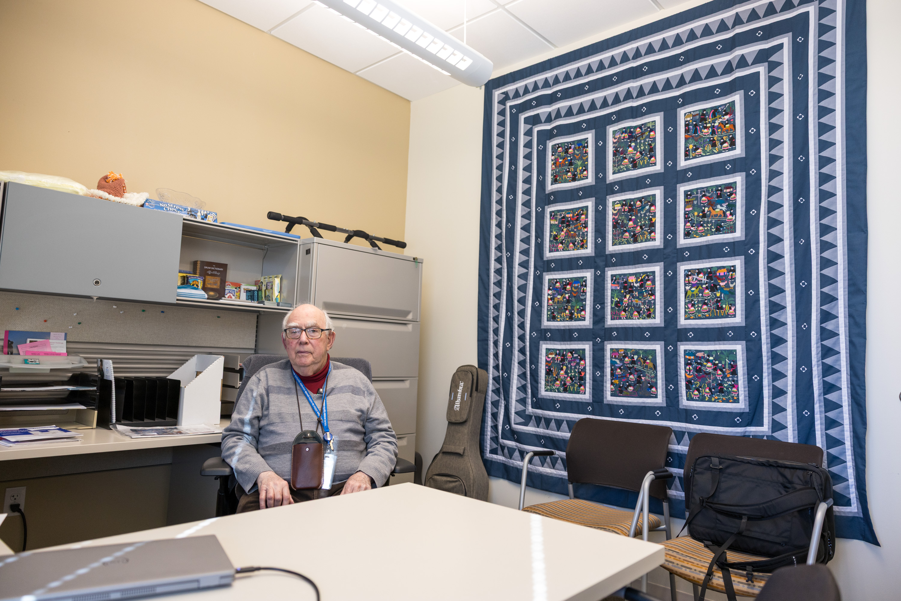 Dr. Kroll sitting in his office