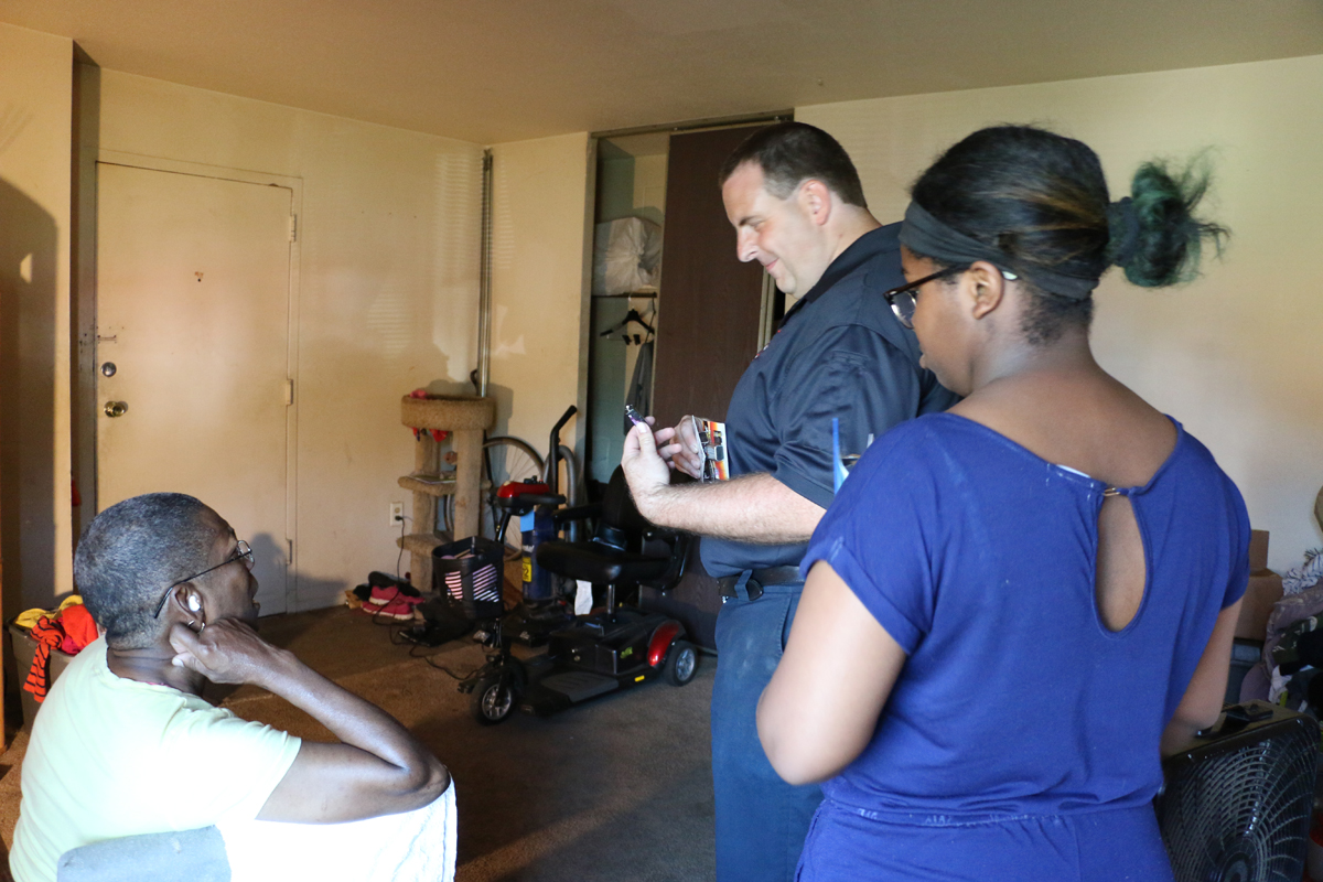 Jeremy Berger, Saint Paul Fire Department, delivering Meals on Wheels at Wilder