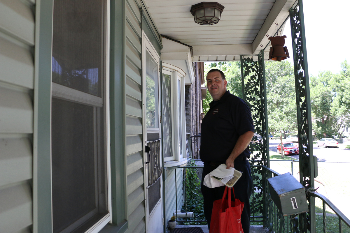 Jeremy Berger, Saint Paul Fire Deparatment, delivers Meals on Wheels