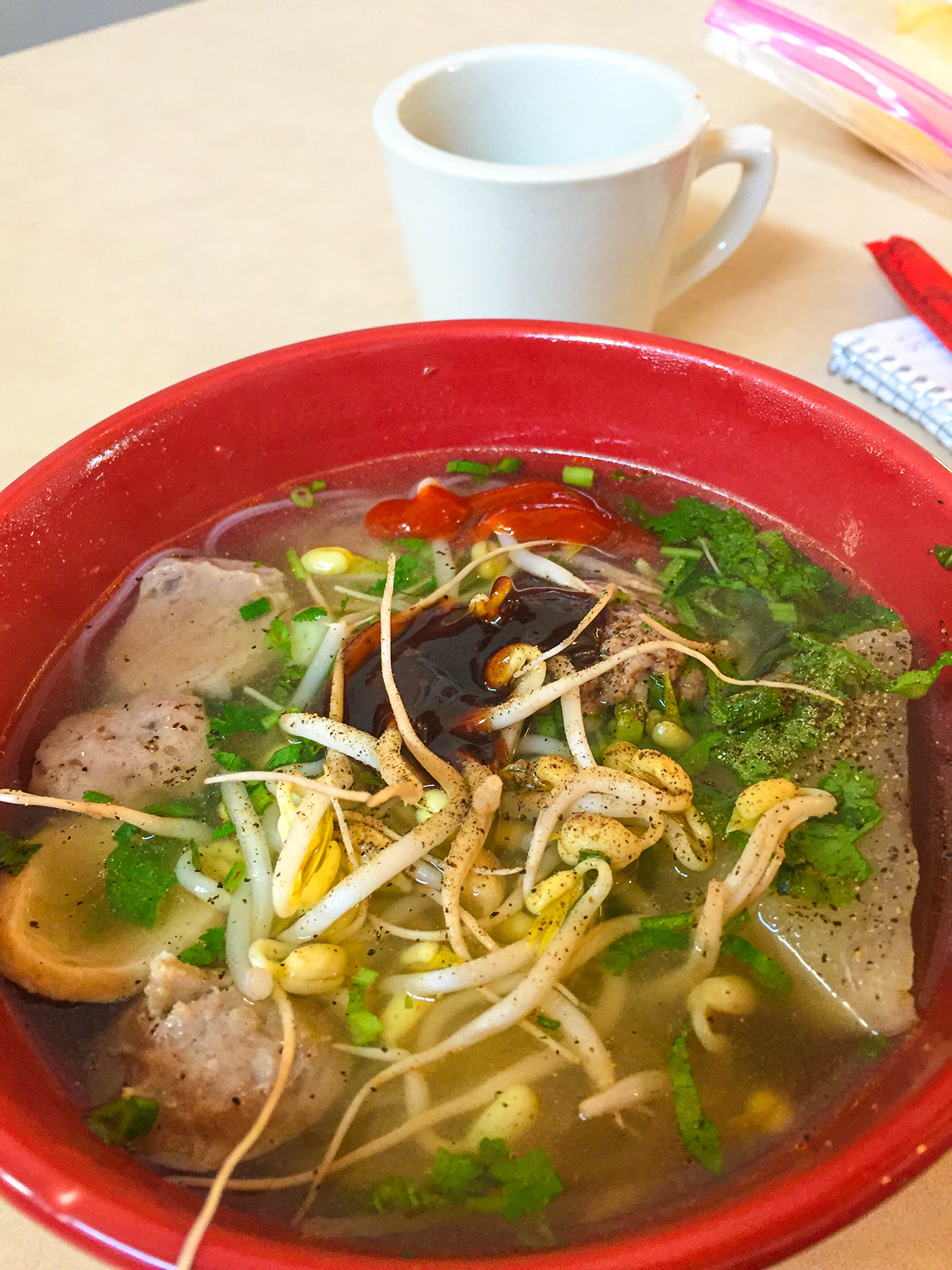 A red bowl with Cambodian soup at the Wilder Center for Social Healing