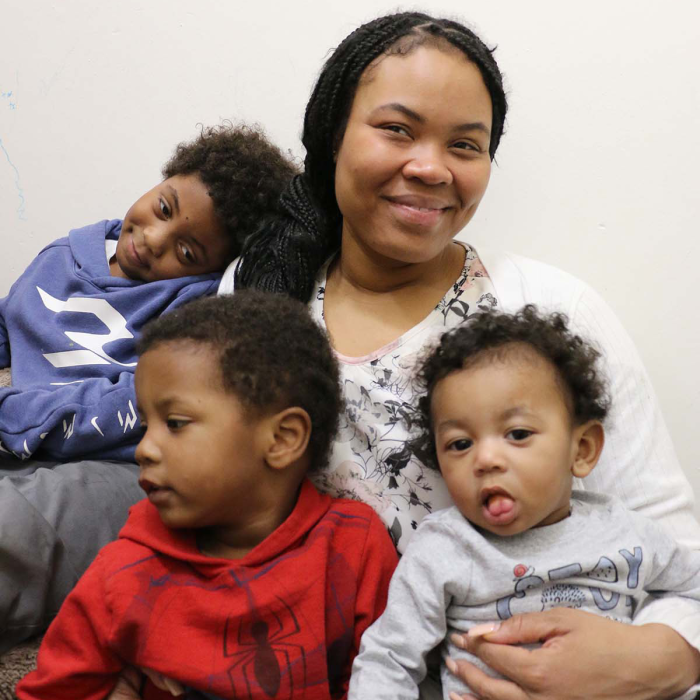 Saint Paul Promise participant Ahmani Curtis with her three sons