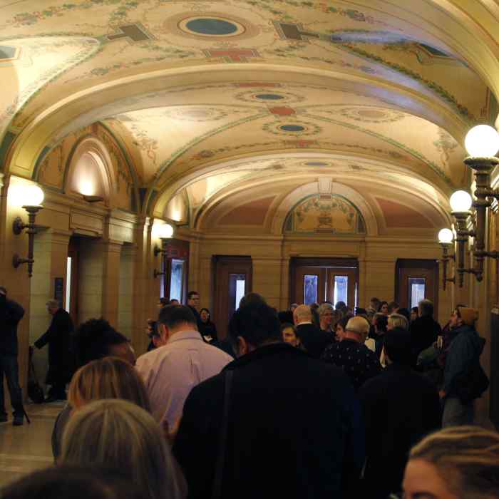 Line of people waiting inside Capitol 