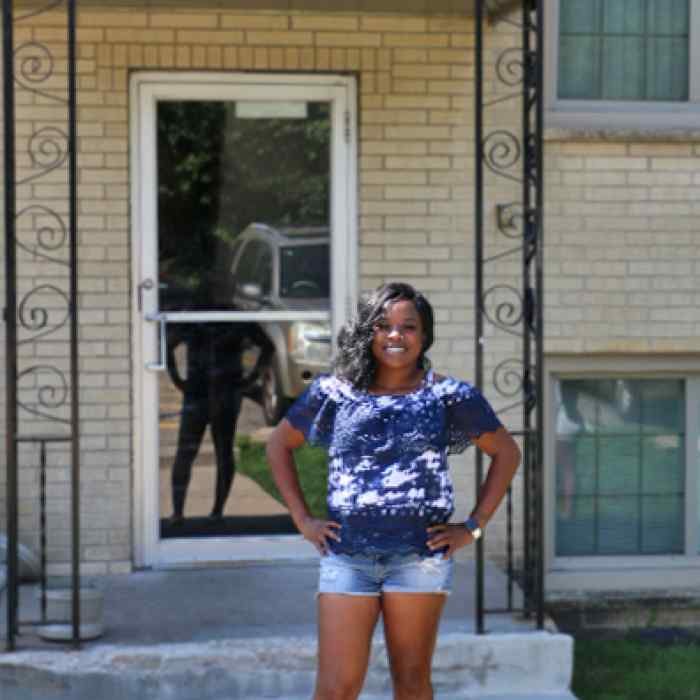 Woman standing in front of building