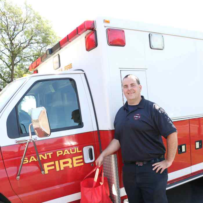 Jeremy Berger, Saint Paul Fire Department, delivers Meals on Wheels at Wilder
