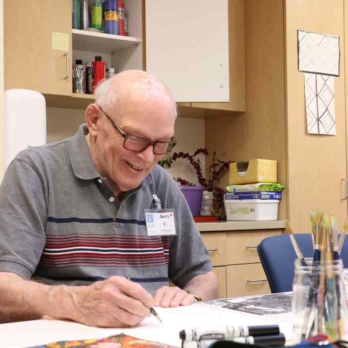 Jerry Castle joins in activities at Wilder Adult Day Health in Saint Paul.