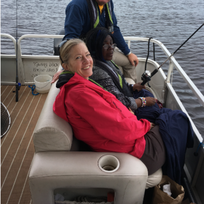 Mary Cahill and Wilder Adult Day Health participant on a boat