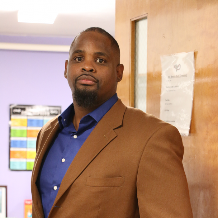 Michael Brooks, a school-based therapist for Wilder, outside his office at Ramsey Middle School