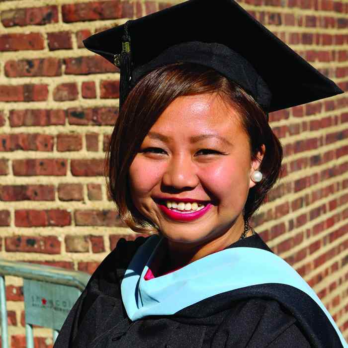 Asian American graduate, Hmong American female smiling, Youth Leadership Initiative alumna