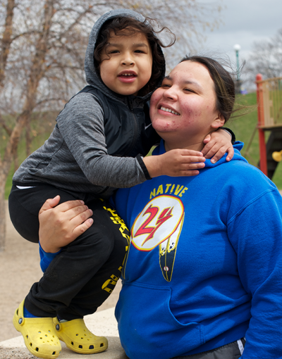 woman & child on playground