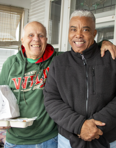 Meals on Wheels recipient Ron Walcheski with volunteer Steven Jones