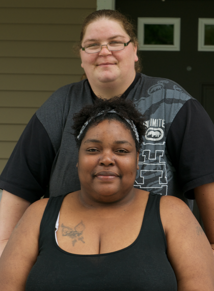 Residents in front of their home in Saint Paul, Minnesota
