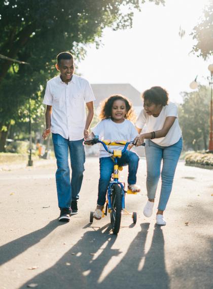 Family playing in the neighborhood