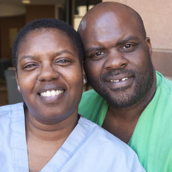 Smiling African American woman and man