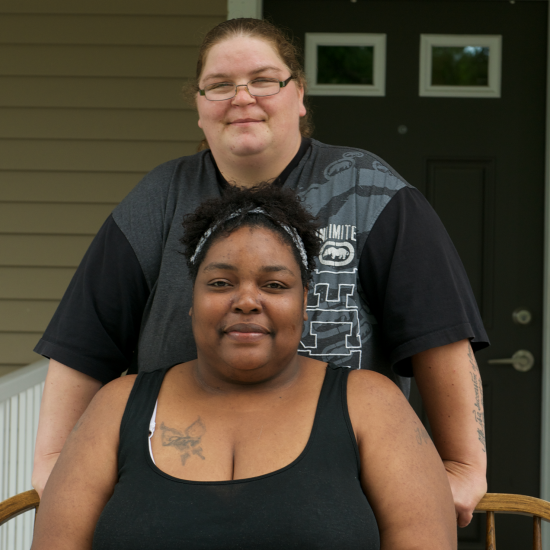 Residents in front of their home in Saint Paul, Minnesota