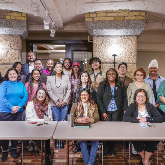 A group of Community Equity Program participants posing with three Minnesota legislators