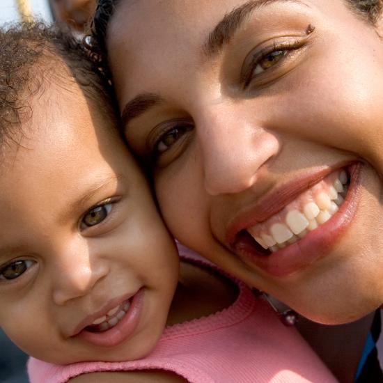 Baby and Mom smiling