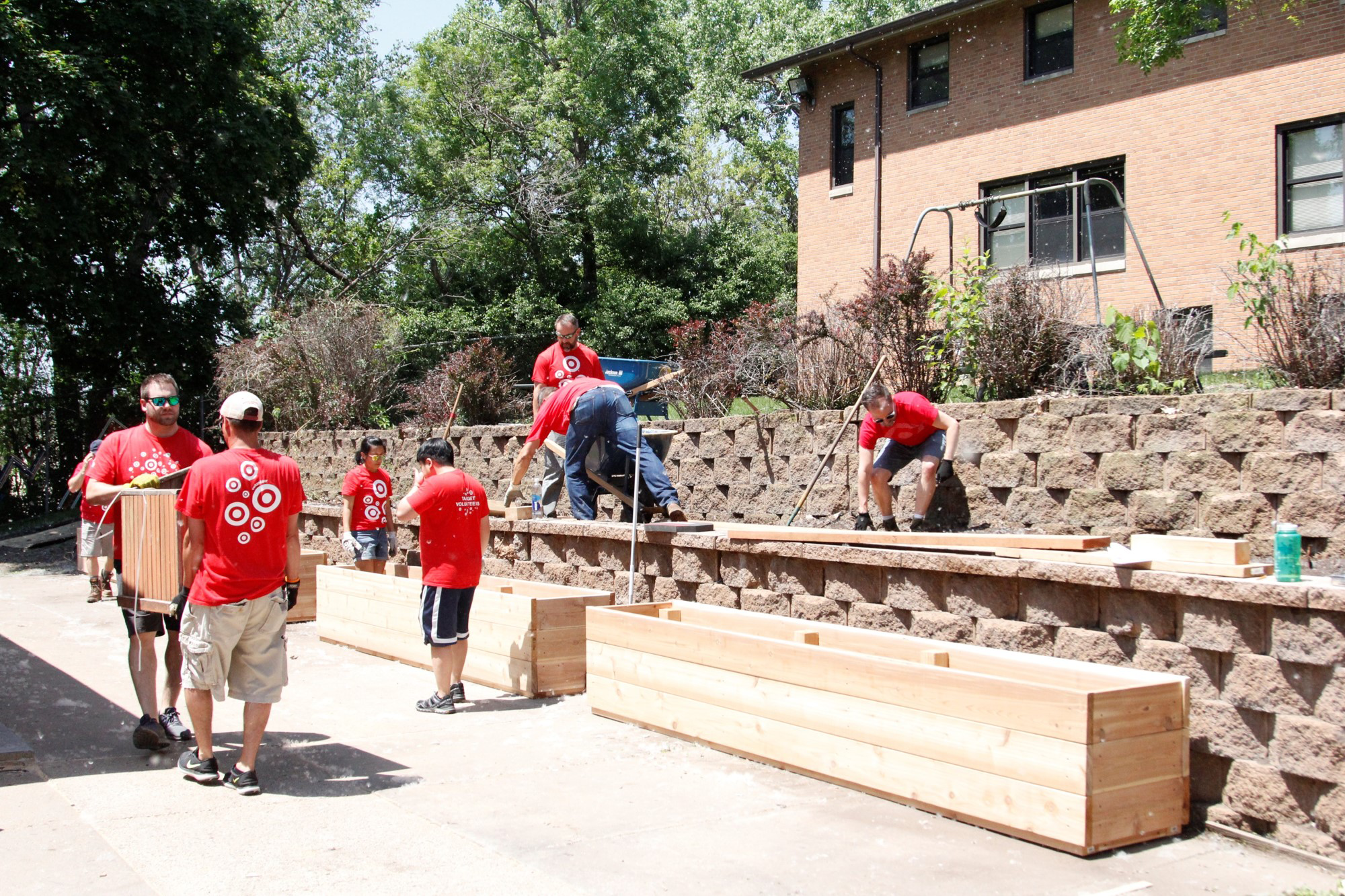 Volunteers working on landscaping at the Wilder Center for Social Healing