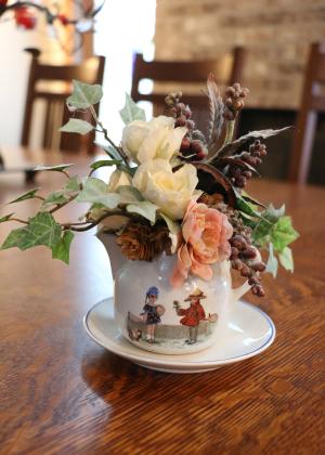 Antique child's tea cup on a table