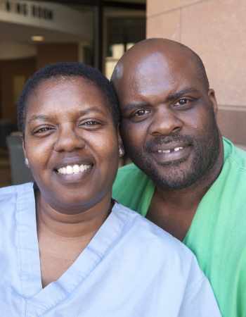 Smiling African American woman and man