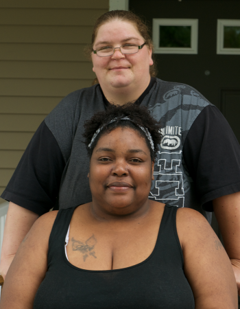 Residents in front of their home in Saint Paul, Minnesota