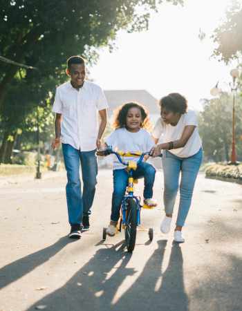 Family playing in the neighborhood