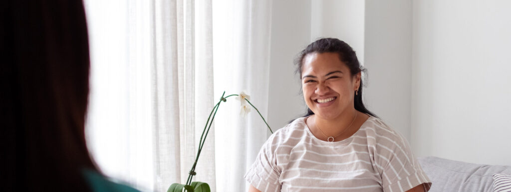 Encouraging therapist talking with female patient
