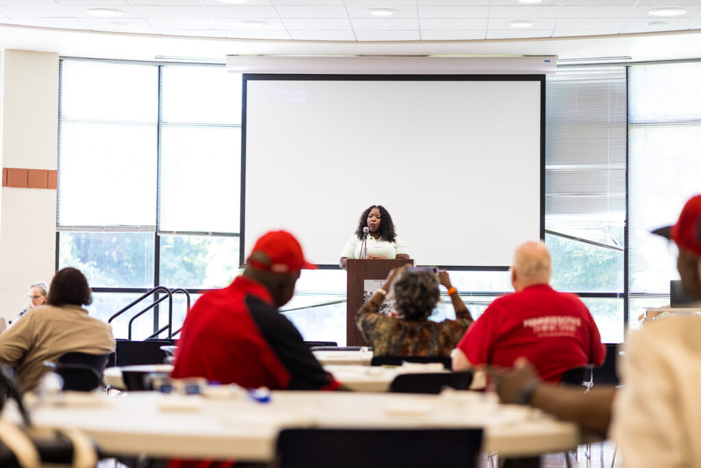 Kimelyn Knight, director of Wilder's Healthy Aging services, speaking to the community about the importance of healthy aging support.